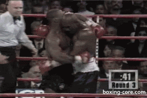 Mike Tyson bites Evander Holyfield