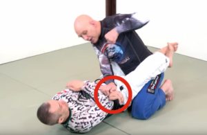 trapping the hand during ground and pound